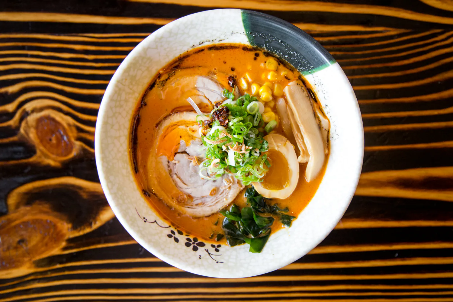 Creamy spicy tonkotsu ramen with pork and egg at Aji Izakaya Cypress, a Japanese Restaurant in Cypress